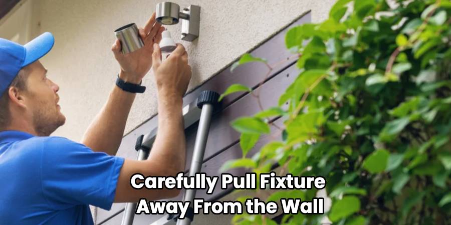 Carefully Pull Fixture 
Away From the Wall