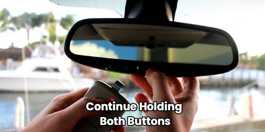 Continue Holding
Both Buttons