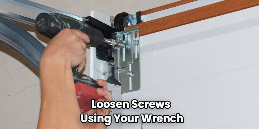 Loosen Screws 
Using Your Wrench