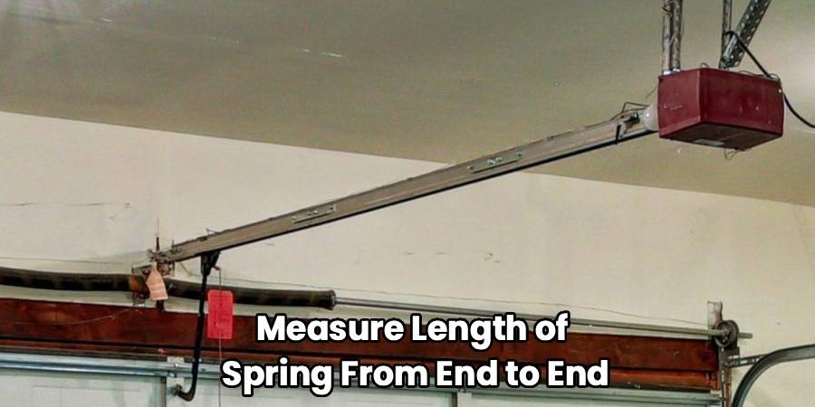 Measure Length of 
Spring From End to End