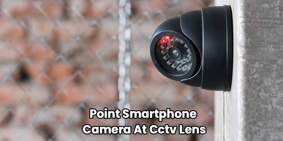 Point Smartphone 
Camera At Cctv Lens
