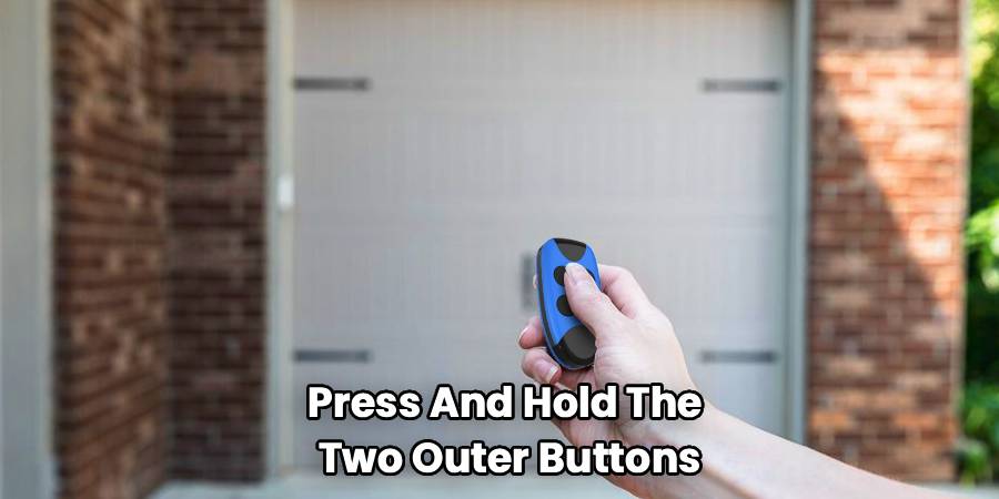 Press And Hold The
Two Outer Buttons