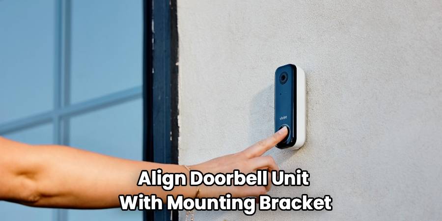 Align Doorbell Unit 
With Mounting Bracket