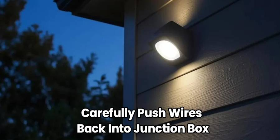 Carefully Push Wires 
Back Into Junction Box
