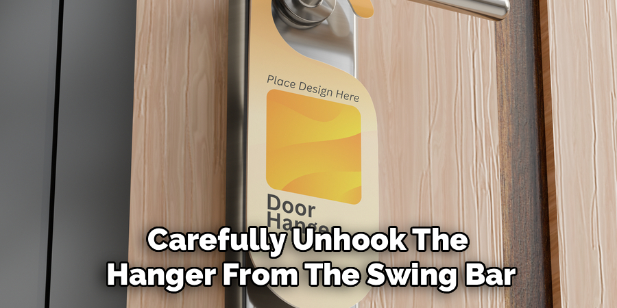 Carefully Unhook The
Hanger From The Swing Bar