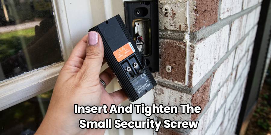 Insert And Tighten The 
Small Security Screw