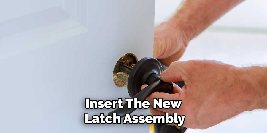 Insert The New
Latch Assembly
