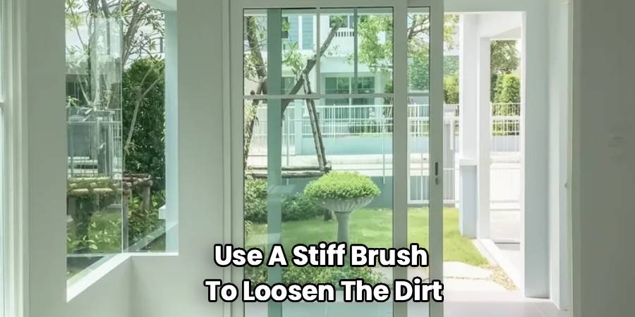 Use A Stiff Brush
To Loosen The Dirt