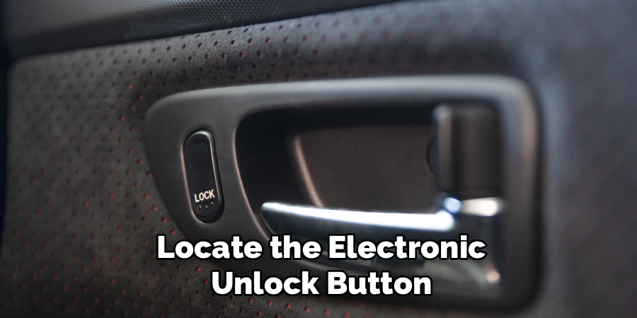Locate the Electronic Unlock Button
