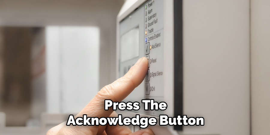 Press the Acknowledge Button