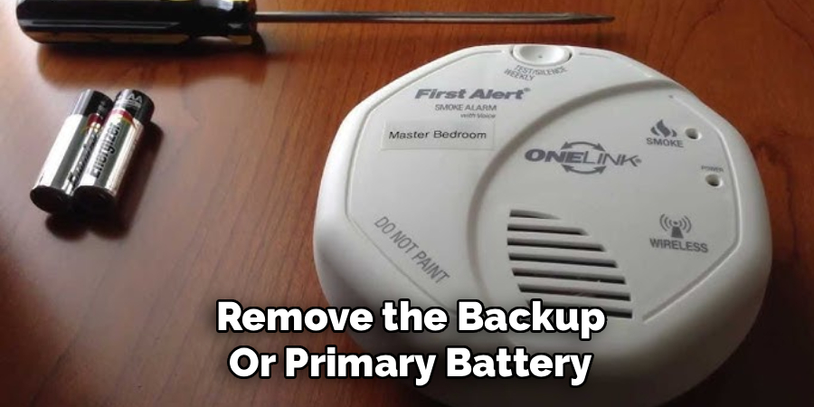 Remove the Backup or Primary Battery